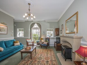 Marvellous living room with superb fireplace | The Coach House, Fremington, near Richmond