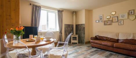 Living/dining area with log burner