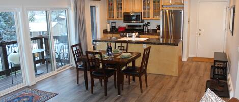 Fully equipped kitchen and dining table. 