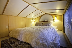cozy queen bed in loft 