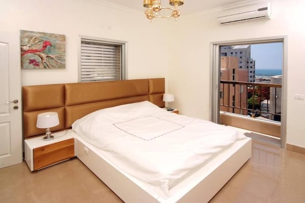Master Bedroom with bath and shower Balcony and Sea view