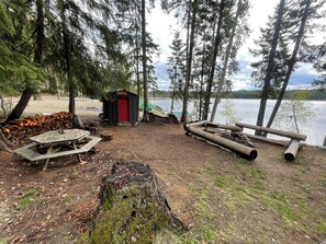 Fire Pit, Shed and Table From BBQ on Deck