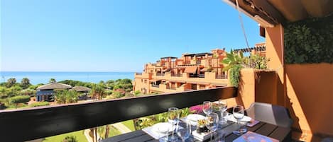 Outdoor dining area for six guests with amazing sea views