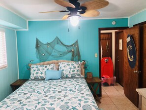 Bedroom. Beach toys in the background.