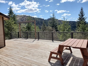 An expansive deck offers room for all of your guests and activities.