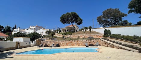 Pool area with Upgraded Sunbeds 