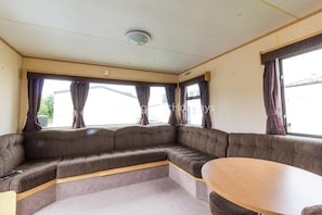 Very spacious lounge area with a TV/DVD player