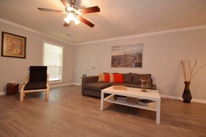 Modern looking living room space. Sofa opens up as well