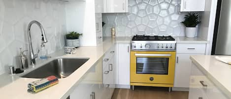 State of the art, modern, retro kitchen with Berttizoni appliances.