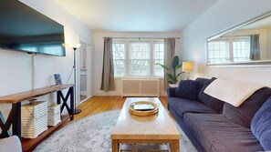 Living room, with lots of natural light throughout the day