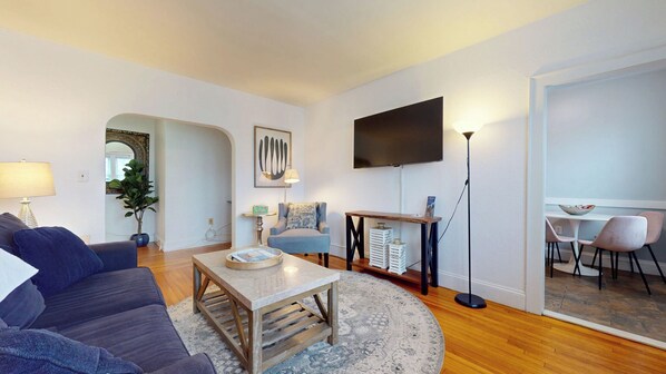 Living toom, TV mounted to wall for easy viewing