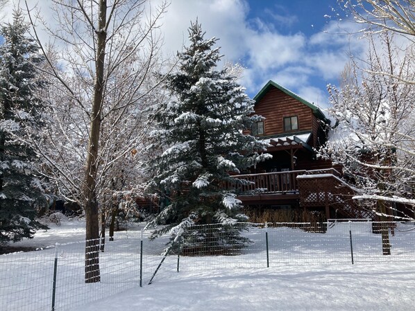 The Wild Turkey Lodge sits on 1.47 wooded acres on Scenic Ogden Canyon Road