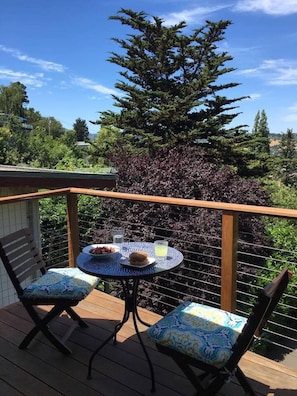 Enjoy breakfast, yoga/pilates or a cup of coffee with a view on the back deck