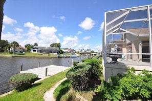 Back view of canal and dock and pool