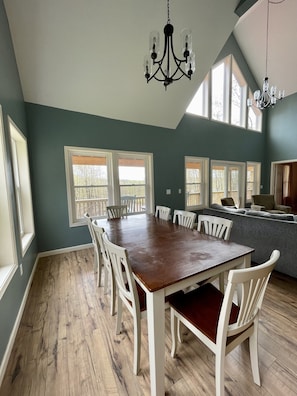 Dining Room sits 8 comfortably. Gorgeous wrap around windows.