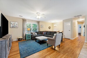 Living room area with plenty of seating.