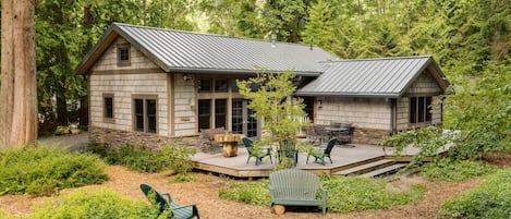 cottage and entertaining area of the large deck