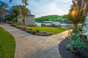 An easy, flat stroll between the main home (left), dock, and guest home (right) 