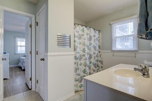 Bathroom between a queen bedroom and the kids bunk room.