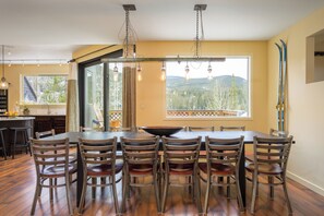 The oversized dining room has a custom table built for 14