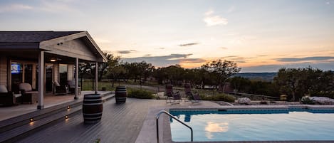 Enjoy sunsets while sipping your favorite beverage from the porch or pool deck.