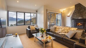 Lounge with open fire and SkyTV