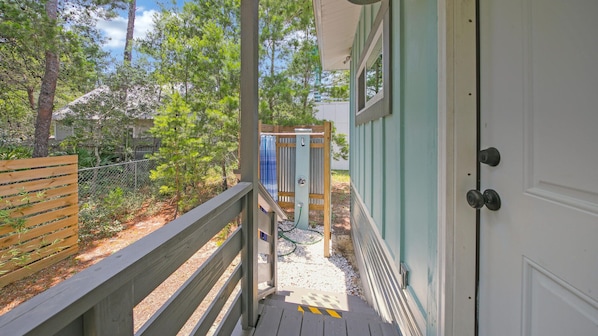 Outdoor shower access off bedroom 1
