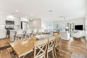 Living + Kitchen + Dining Area and table for 8+