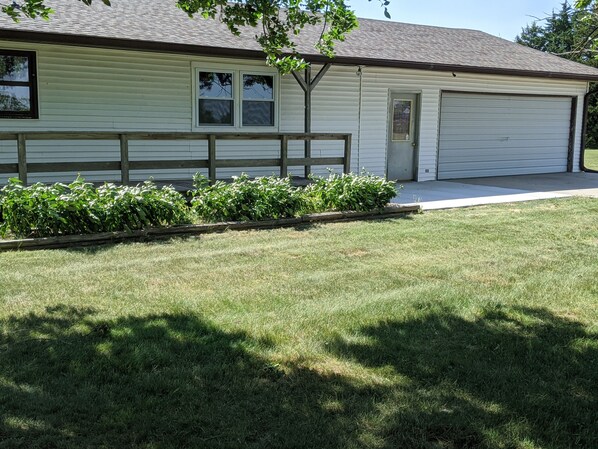 Front porch and double garage