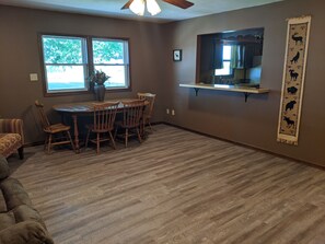 Pass through between kitchen and dining area. Dining table easily seats 6