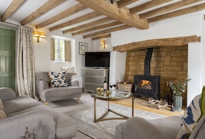 Ground floor: Large sitting room and dining area with inglenook fireplace