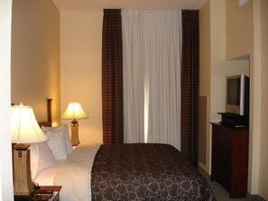 Get a peaceful night sleep in our cozy bedroom.