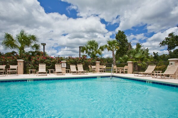 Relax by the pool in the summer.