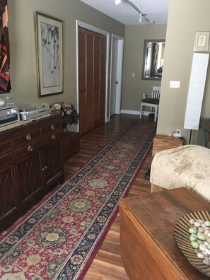 Washer/dryer behind louvered doors just outside of suite.