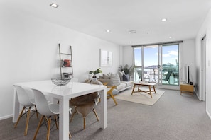 Open plan living and dining area with lovely natural light