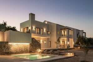 main facade, two pools and waterfall