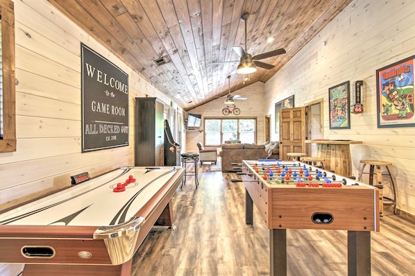 The kids will never want to leave! Game Room has air hockey, foosball tables, and Roku TV.