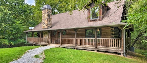 The serene woods of Sulphur Springs surrounds you at this vacation rental.