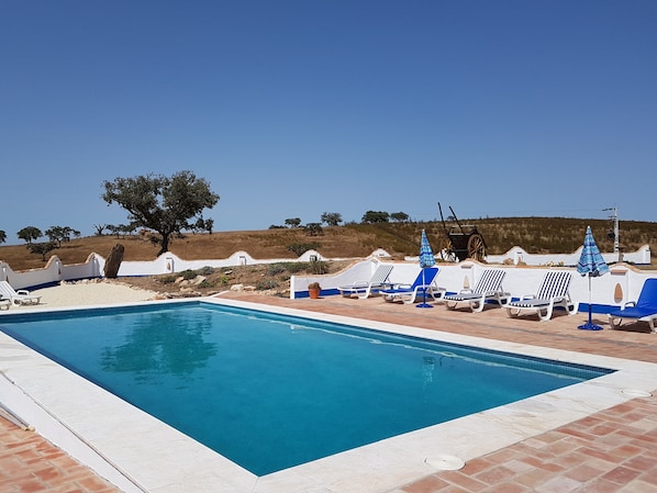 Soak up the sun beside the pool. Children can play on their own little beach!