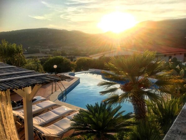 Private Pool area in the upper level at sunset