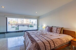 At the top of the stairs, you can see the spacious king-sized loft bedroom!