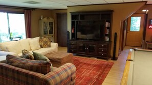 Basement playroom with surround sound TV