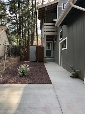 Paved parking & sidewalk to your own private entrance and enclosed courtyard.