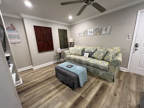 Ottoman opens to chair, lounge, or a xl twin bed. Additional mattress topper.