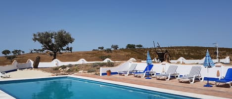 Relax by the pool while the children play on the beach