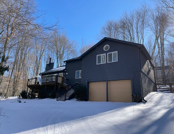 This is the front of the house covered in snow in the winter!