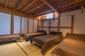 4 single beds in 1st floor bedroom