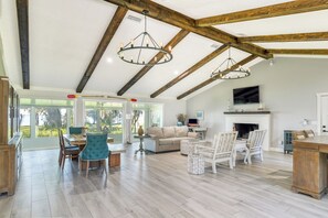 The living room is spacious enough for 2 or 3 families