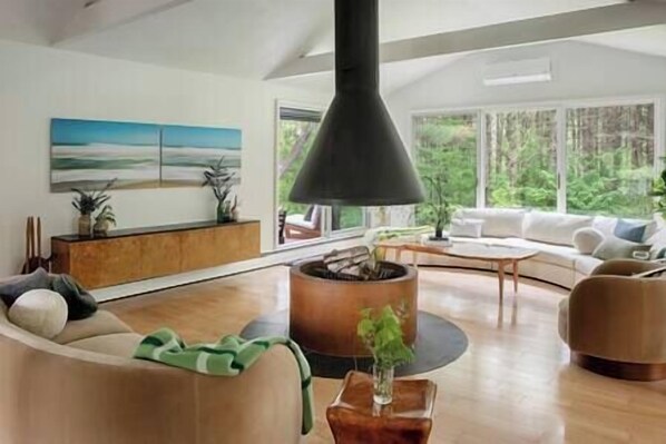 cozy up with the Swedish fire pit, credenza filled with board games 