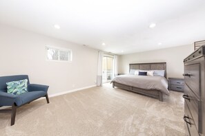 Very large master bedroom, king sized bed and sliding glass doors lots of light